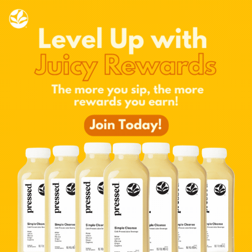 Yellow smoothie bottles in a row advertising the juicy rewards loyalty program.