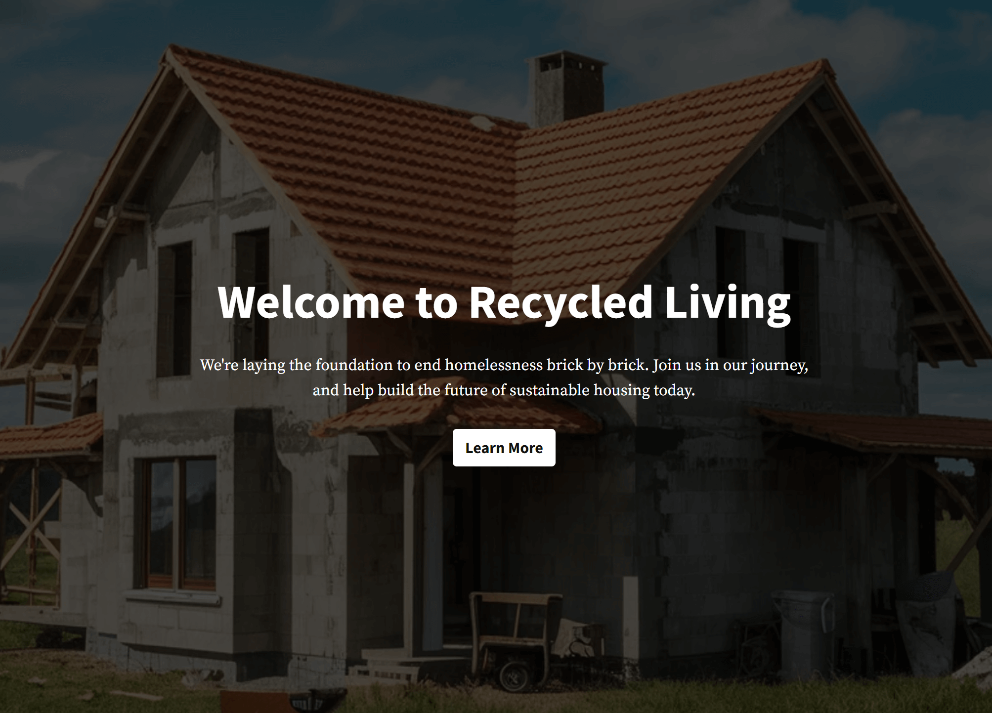 A landing page that reads Welcome to Recycled Living with a large house under construction as the main element.